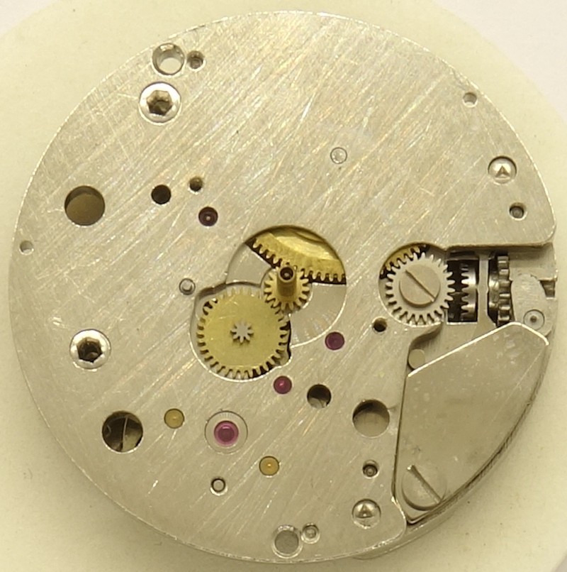 Zifferblattseite mit Minutenrohr und Wechselrad Sonceboz ES 54: Zifferblattseite mit Minutenrohr und Wechselrad